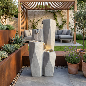Faceted Stone Columns Solar Water Feature with LED Lights and Battery Backup